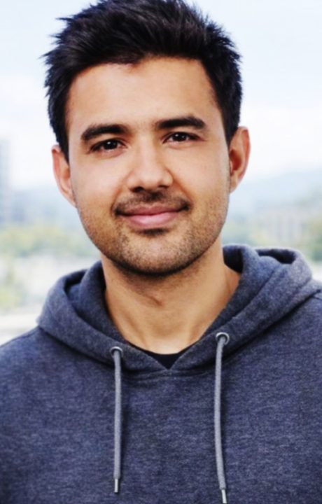 A headshot of Archie Sharma