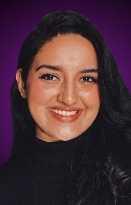 A headshot of Kiran Kaur Raina