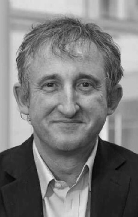 A headshot of Simon Hansford